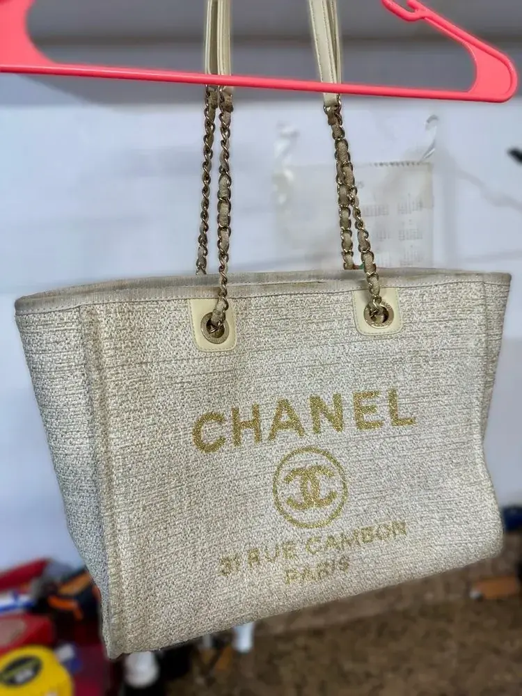 Cleaned Chanel Deauville tote showing restored fabric texture