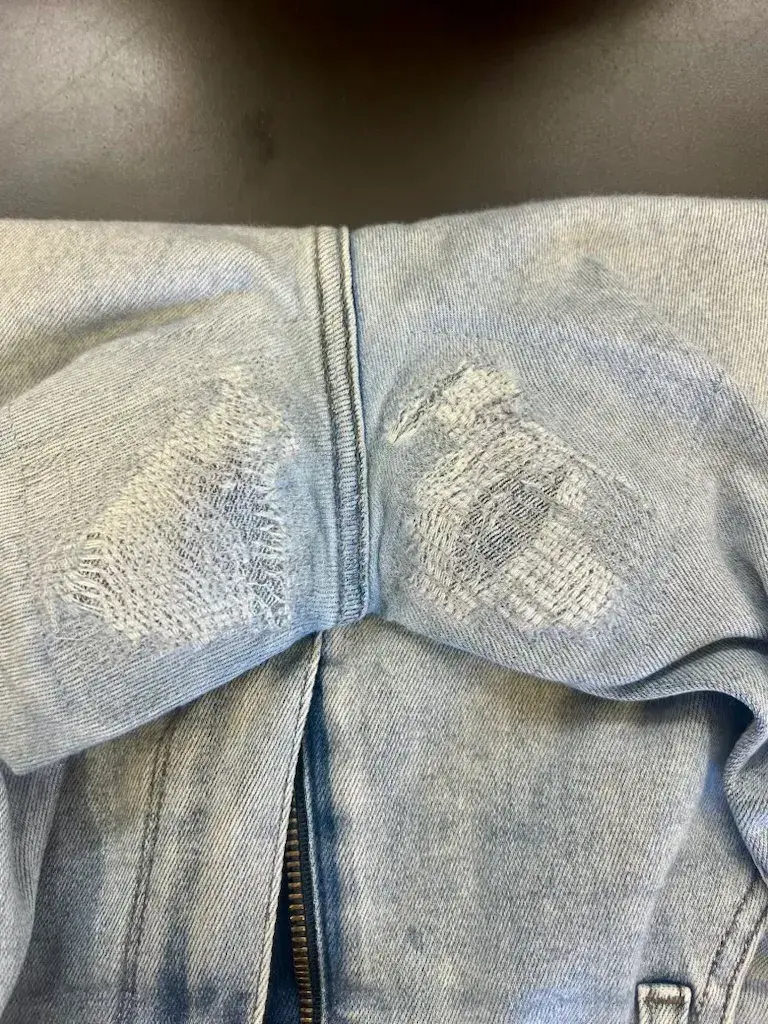 Inner-thigh jeans repair rewoven and reinforced with color-matched thread at Baroni Cleaners Irvine