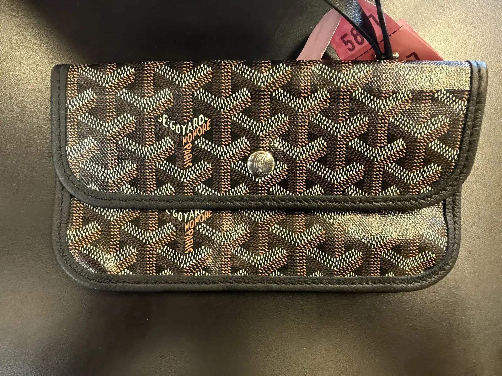 Matching Goyard pochette cleaned alongside the Saint Louis tote at Baroni Cleaners