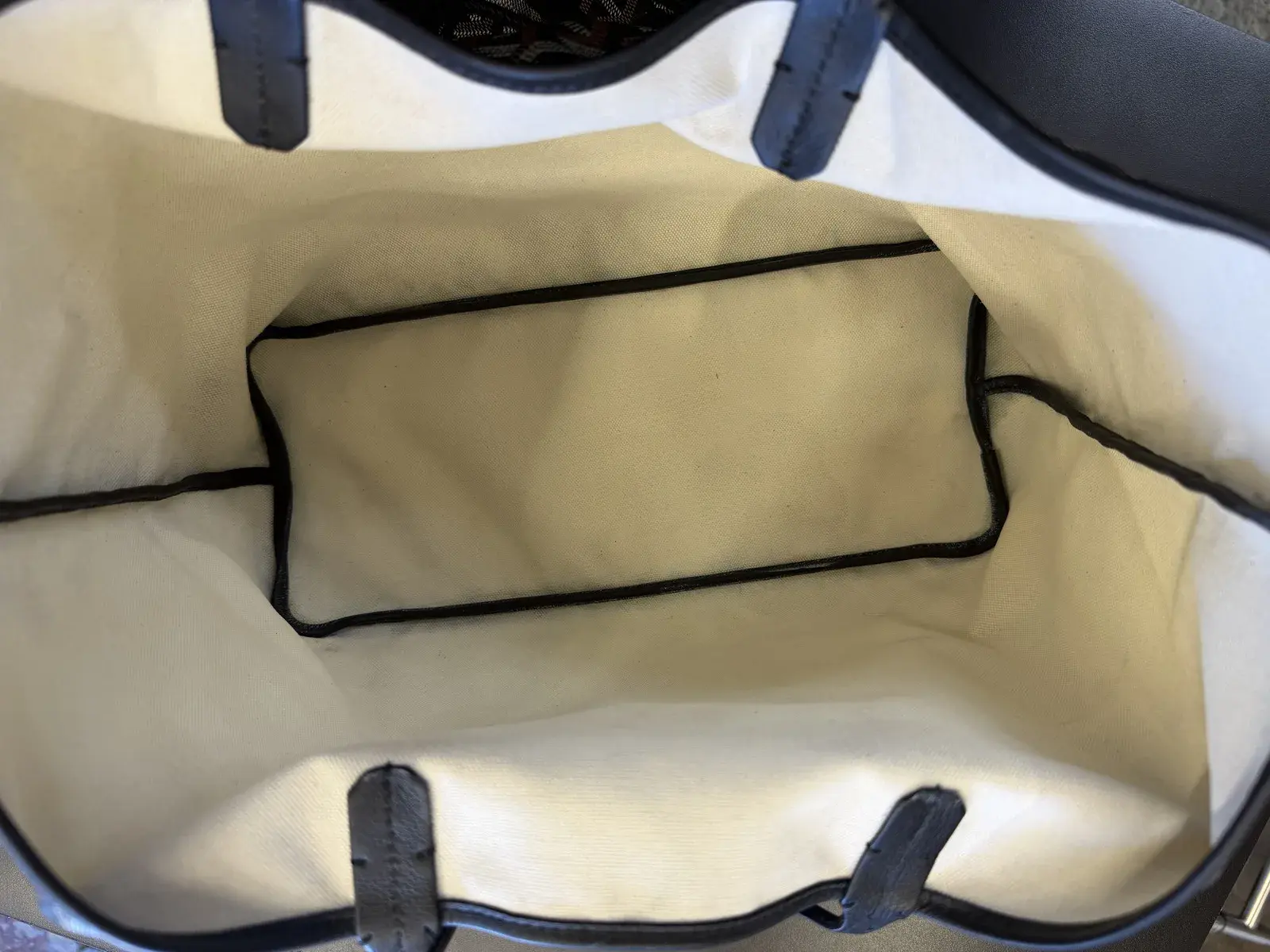 Interior of the same Goyard Saint Louis tote after cleaning at Baroni Cleaners, canvas lining returned to its original cream color