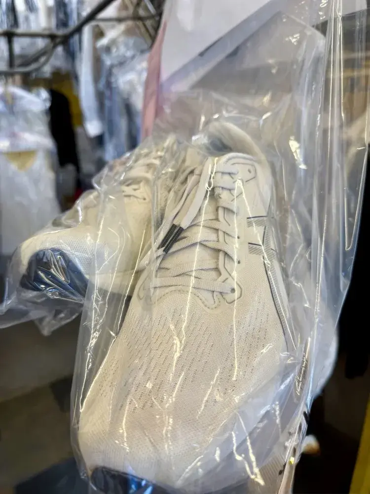 Running shoes restored to bright white after deep cleaning at Baroni Cleaners