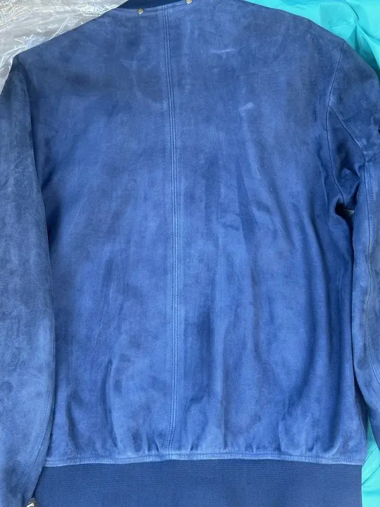 Close-up of restored suede texture on Paul Smith jacket