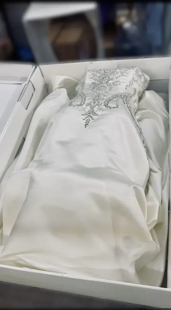 Wedding dress in acid-free preservation box by Baroni Cleaners
